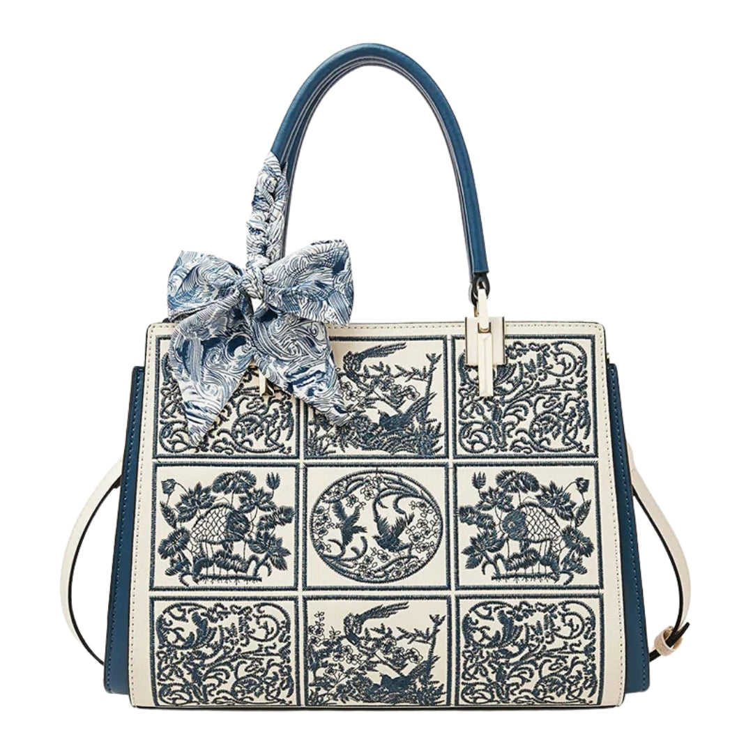 sylvia™ – unik broderi crossbody med sløyfedetalj