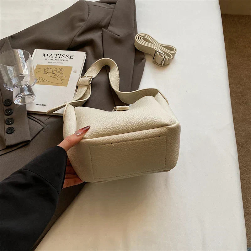 Iris™ – Moderne Skinnlook Bøtteveske